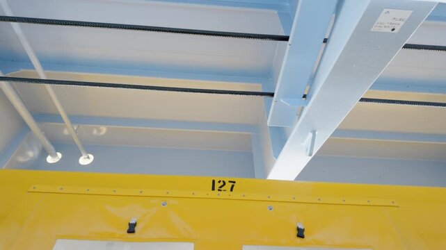 Close Up of Number 127 on Bright Yellow Cruise Ship Lifeboat Canopy