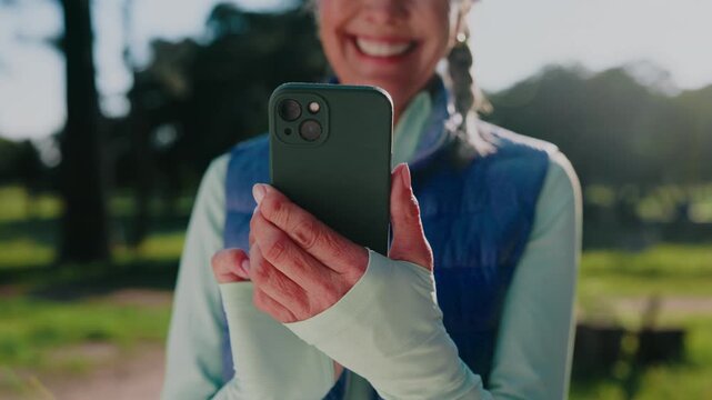 Phone, hands and happy woman typing in nature for social media, workout tips or online texting. Active, female person or fitness app with smile or technology for mobile chatting or conversation