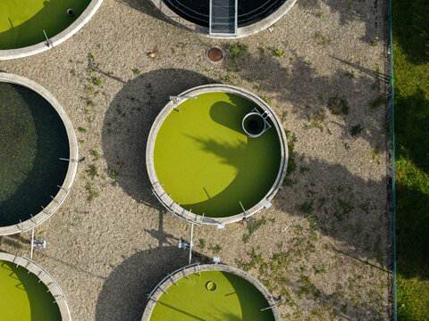 Wastewater treatment plant with circular clarifiers purifying sewage water