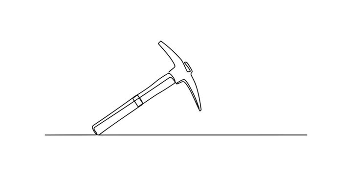 Continuous single line drawing of a pickaxe tool used for mining and construction work
