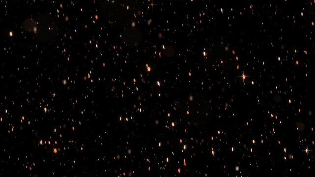 Rose gold glitter raining on a black background with blush pink shimmer and soft bokeh for romantic wedding and beauty overlays