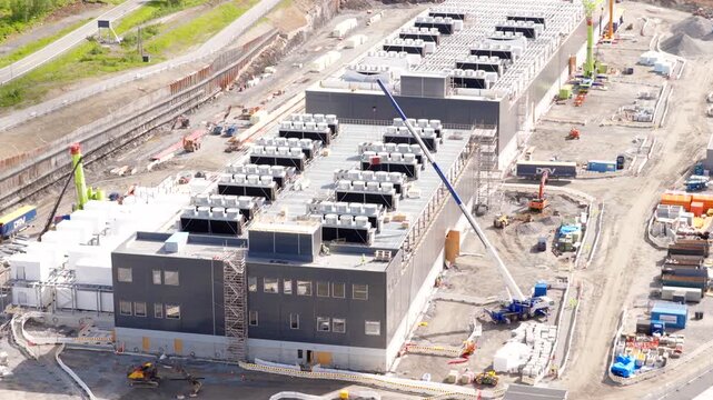 Data centre construction site with lots of activity in Bjervik, Norway. Aerial