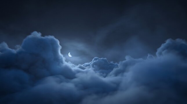 Crescent moon glowing behind thick dark blue clouds in the night sky