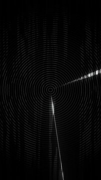 Circular outlines surround central point streaks dots cut dark field. radar inspired monochrome background technology presentations, communication graphics, science visuals futuristic video titles.