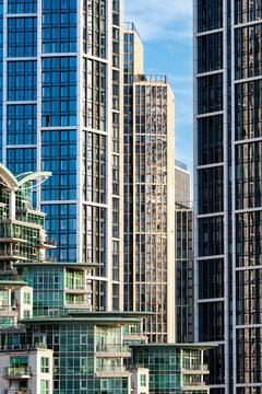Modern towers and apartments in London create an urban skyline where architecture and facades form a dense vertical skyline of towers and apartments