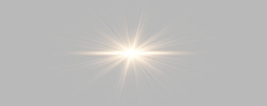 A radiant gold light burst shines at the center of a black background. The rays spread symmetrically with soft, diffused edges extending outward. This glowing flare effect is ideal for.