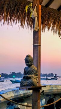 The Buddha statue is one of the hotel's iconic landmarks in Karimun jawa, offering a peaceful tropical atmosphere complemented by beautiful ocean views and a breathtaking sunset.