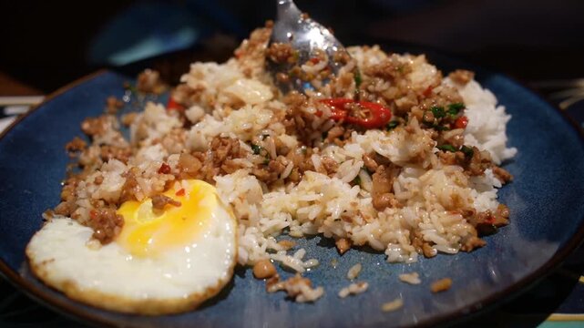 Thai basil beef with rice and fried egg "pad ka praow"