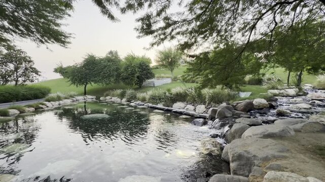 Doha, Qatar - October 07, 2026: Beautiful Katara waterfall North Hill park in Katara Cultural Village Doha Qatar
