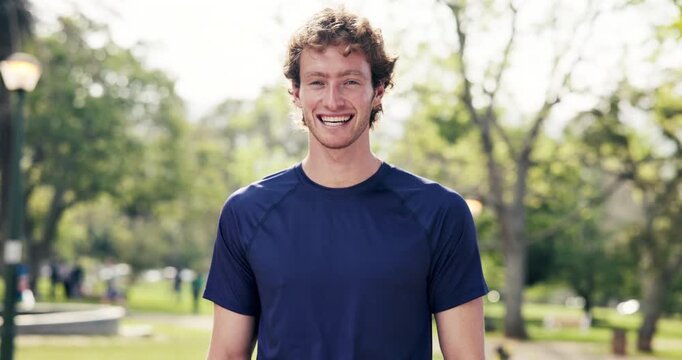 Fitness, face and man in park with laugh, positive attitude and workout hobby on weekend break. Happy, bokeh and athlete in nature with joke reaction, confidence and good mood in training activity.