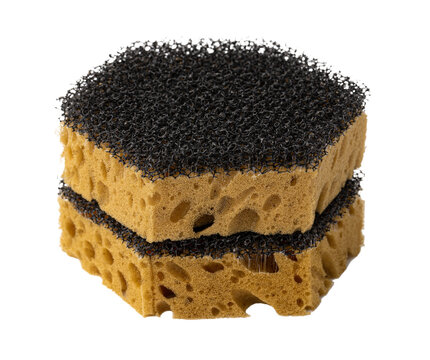 Two sponges stacked together showing different textures and materials in a simple arrangement
