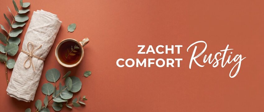 Herbal tea cup eucalyptus branches on terracotta background with Dutch text Zacht Comfort Rustig, rustic linen roll and negative space, cozy wellness spa flat lay banner template for calm lifestyle.