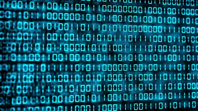 Binary code running through a dark technical environment. Programming and future data systems