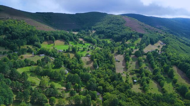 Aerial drone view of the beech forest and countryside landscape in Las Machorras, Las Merindades. Pasiegos Valleys of Burgos. Castile and Le&oacute;n. Spain. Europe
