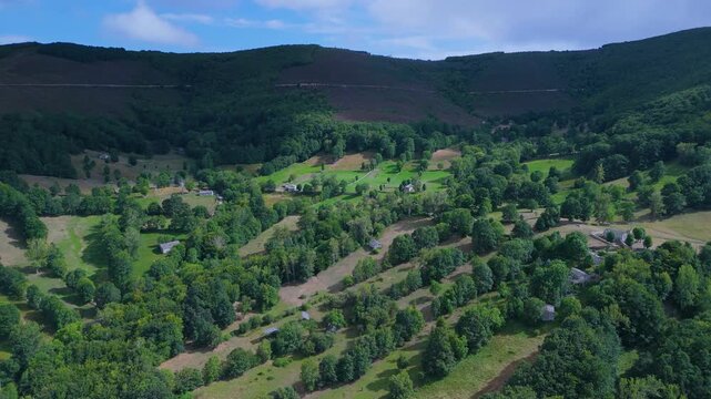 Aerial drone view of the beech forest and countryside landscape in Las Machorras, Las Merindades. Pasiegos Valleys of Burgos. Castile and Le&oacute;n. Spain. Europe