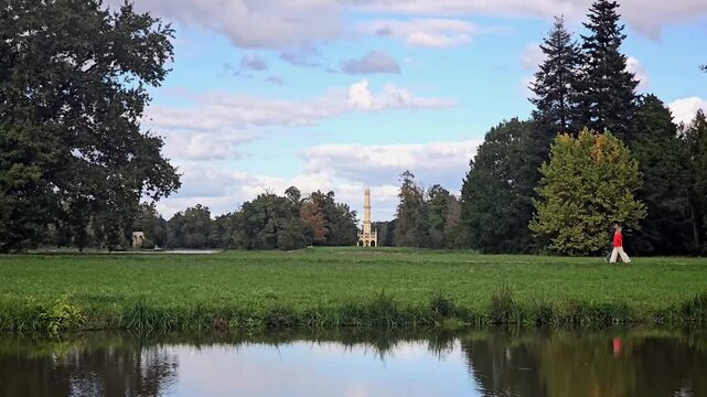 Time lapse of Lednice park pond and historic minaret tower