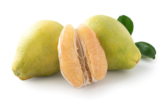 Fresh pomelo fruit with leaf isolated on white background with clipping path.