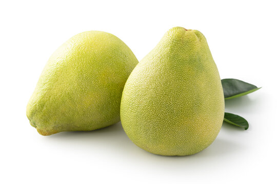 Fresh pomelo fruit with leaf isolated on white background with clipping path.