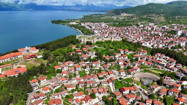 Aerial drone view of Tsar Samuel's Fortress on a hill in Ohrid, North Macedonia. Scenic panorama overlooking Lake Ohrid and the surrounding landscape.	

