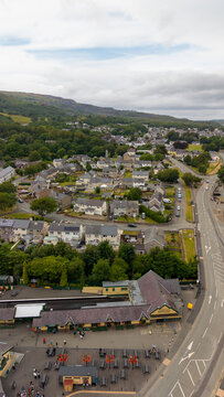 Aerial Photo Llanberis Wales. Llanberis is a village, community and electoral division in Gwynedd, northwest Wales, on the southern shore of Llyn Padarn and at the foot of Snowdon.