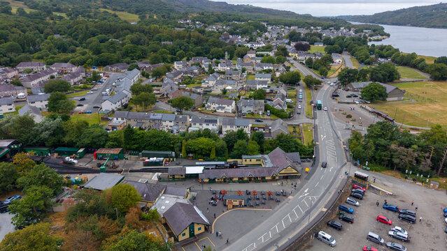 Aerial Photo Llanberis Wales. Llanberis is a village, community and electoral division in Gwynedd, northwest Wales, on the southern shore of Llyn Padarn and at the foot of Snowdon.