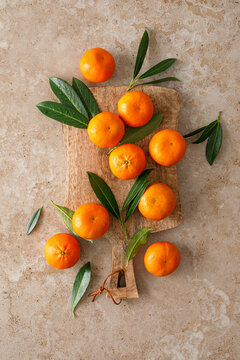 Mandarins fresh citrus fruit with green leaves