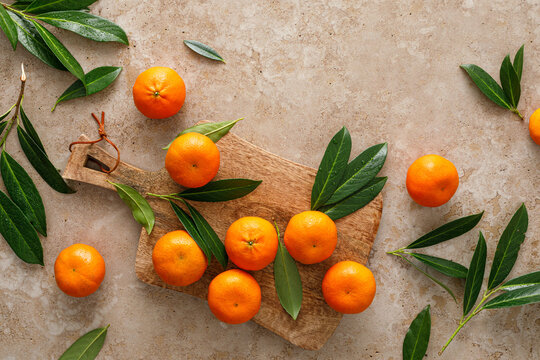 Mandarins fresh citrus fruit with green leaves