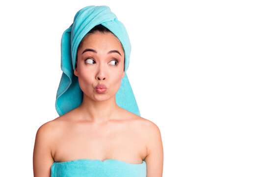 Photo of young attractive asian girl pouted lips dream look empty space spa procedure isolated over pastel color background