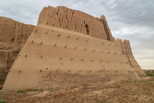 Kyzyl-Kala, an ancient (1st - 4th centuries AD) desert fortress in Karakalpakstan, Uzbekistan. The lower part of the wall has been restored 
