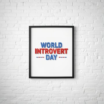 World introvert day typography design inside black wooden frame hanging on bright white painted brick wall showcasing modern interior decoration setup mockup template