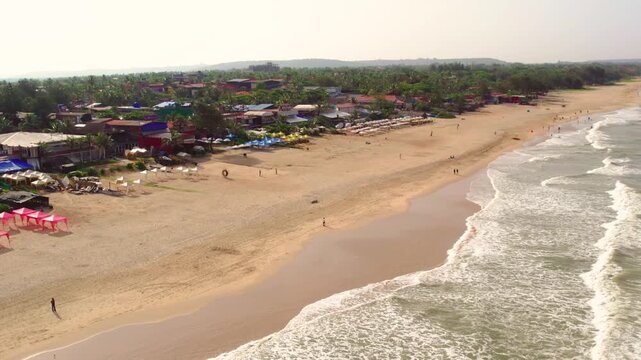 Aerial drone view of vagator beach in goa india showing coastline