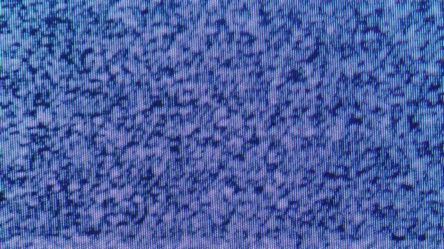 Blue screen static flickers around a pale horizontal band