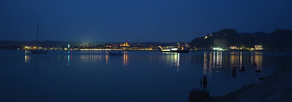 Anamorphic Lens - Night landscape in Arona on lake Maggiore.