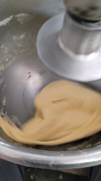 Donut Dough Mixing in Medium Bakery Mixer, Home Industry Food Production Footage