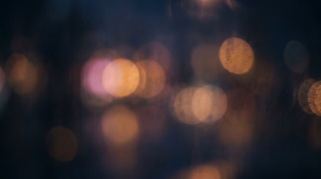 Soft colorful bokeh lights glowing on dark abstract background with glowing orbs blurred light defocused lig