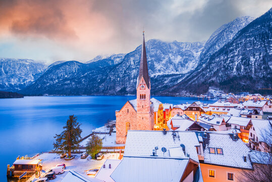 Hallstatt, Austria. Winter snow-covered village on Hallstattersee Lake - Upper Austria