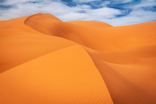 Merzouga, Morocco. Sand dunes in the Sahara Desert, North Africa - Erg Chebbi dunes.