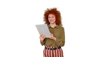 Young redhead woman smiling, holding a digital tablet, interacting with technology, portable device, transparent background © Komora