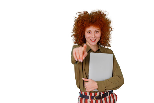 Woman pointing at camera, holding laptop, smiling, showing selection or hiring, transparent background