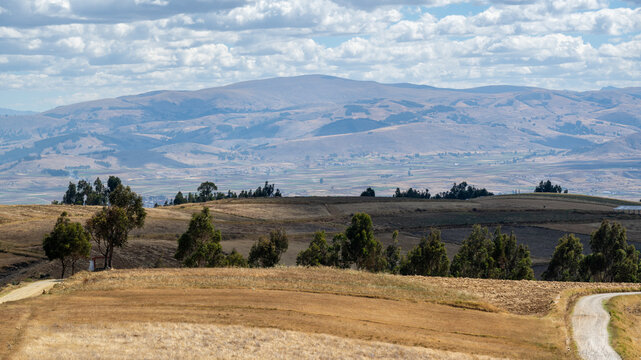Huancayo, Jun&iacute;n, Per&uacute; : Dry agricultural fields overlook the Mantaro Valley and rounded Andean mountains near Huancayo. This elevated rural landscape outside Huancayo, Peru, shows harvested farmland/