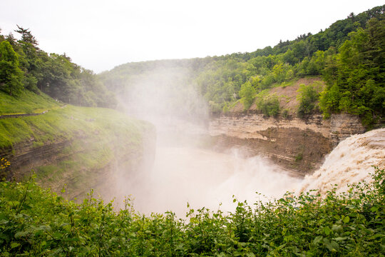 The Genesee river gorge, elevated view over the river and mist rising from the water surface.
