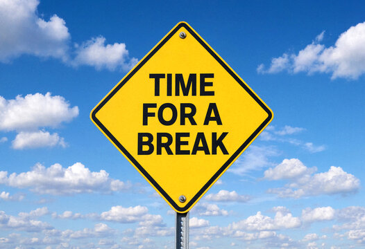 Yellow road sign indicating time for a break against blue sky