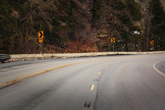 Highway 97 over Blewett Pass, an empty multilane road through the mountains.
