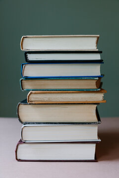 Stack of old hardcover books, close up