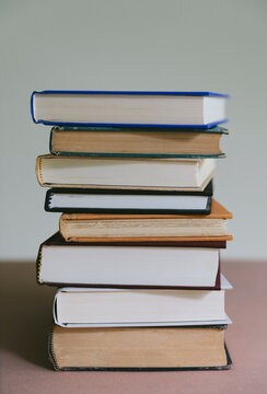 Stack of old hardcover books, close up