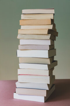 Pile of balancing paperbook books