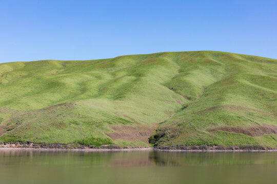 The Palouse, a large fertile agricultural prairie region, an undulating hillside, crop patterns on the slopes above the Snake River