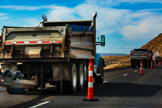 Highway construction along Interstate 90, a truck with construction materials parked up.
