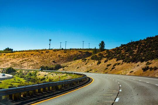 A bend in the road on a multi lane highway on Interstate 90