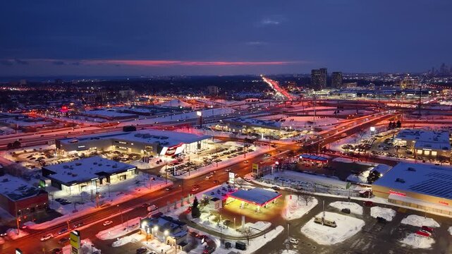 Evening winter view of traffic urban landscape CF Shops Don Mills North York, Ontario, Canada aerial